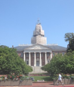 State House with iconic dome shrouded by drop cloths for $500,000 repainting.