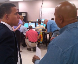 BGE vice president Darryl Stokes, right, briefs Lt. Gov. Anthony Brown at a regional command center in Odenton where the company is coordinating power restoration efforts.
