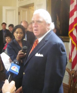 Senate President Mike Miller talks to reporters after bill signing.
