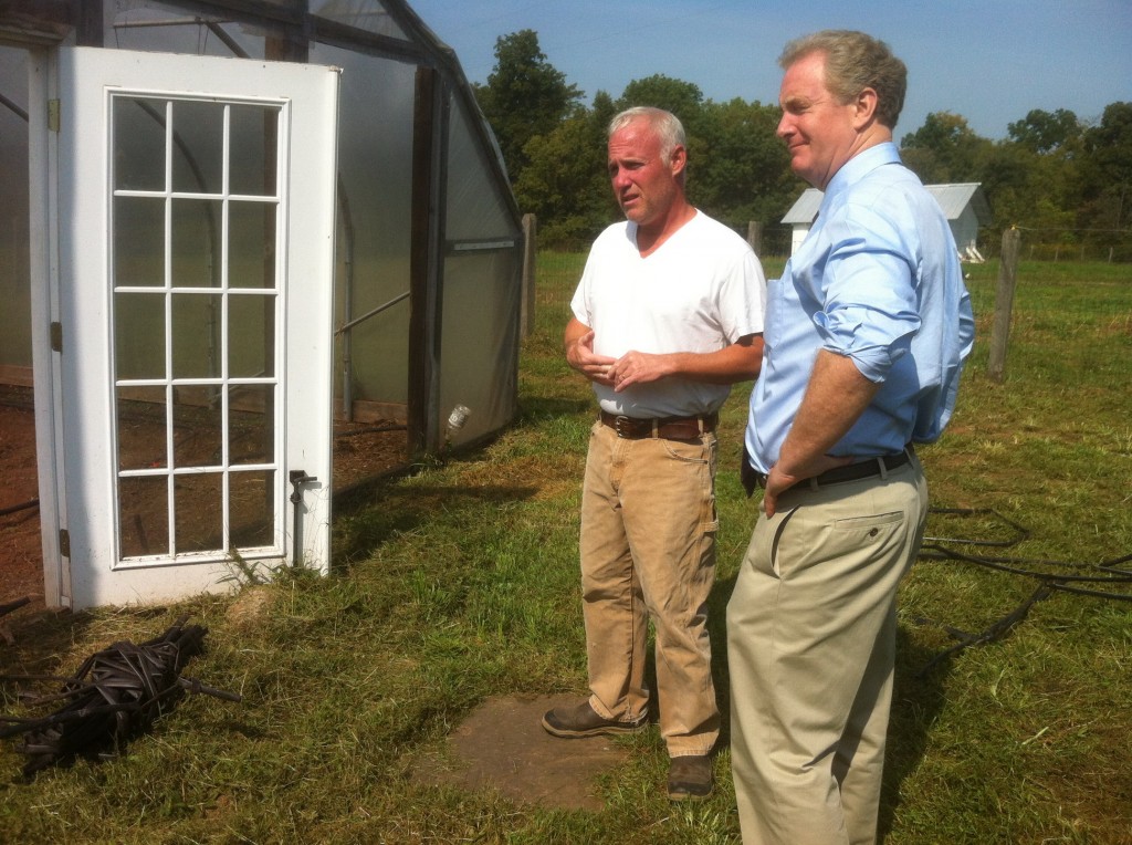 Rep. Chris Van Hollen discusses sustainable farming with Whitmore Farm manager Will Morrow