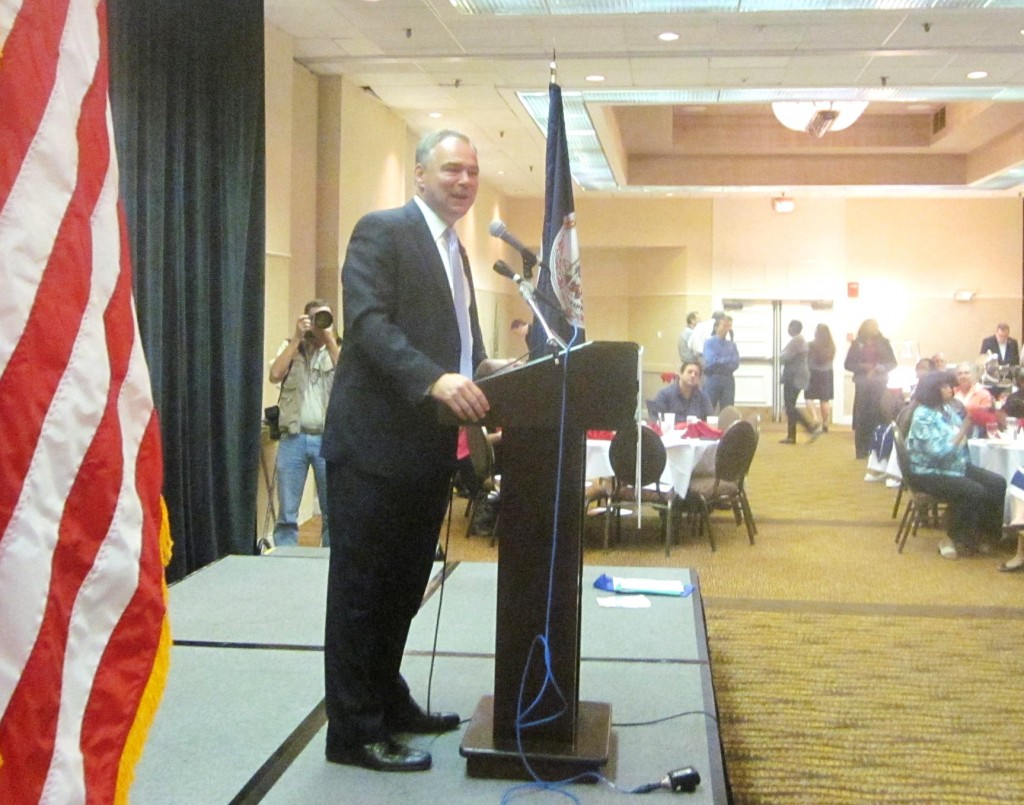 Former Virginia Gov. Tim Kaine talks to his state's delegates in Charlotte.