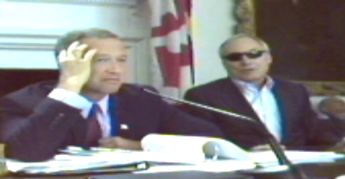 Comptroller Peter Franchot, right, donned sunglasses after laser eye surgery at the Board of Public Works with Gov. Martin O'Malley. (From streaming video)