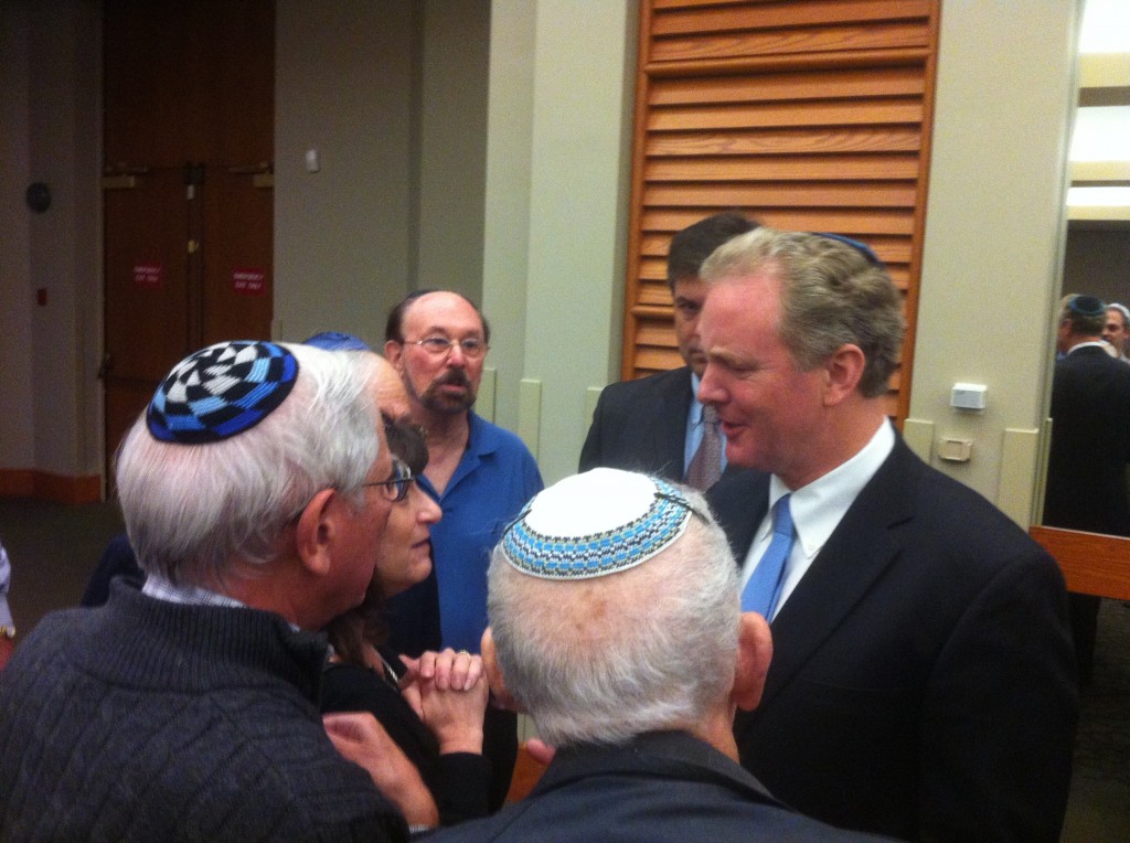 Rep. Chris Van Hollen, right, talks to members of B'nai Israel Congregation.