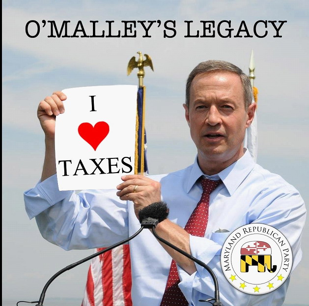 A fictional photo of Gov. Martin O'Malley holding up a sign saying "I love taxes." 