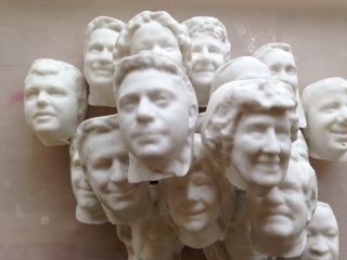 Some of the manufactured heads of members of the General Assembly, some more recognizable than others.