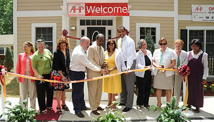 Ribbon cutting for Aunti Hattie's Place included a number of Montgomery County officials.