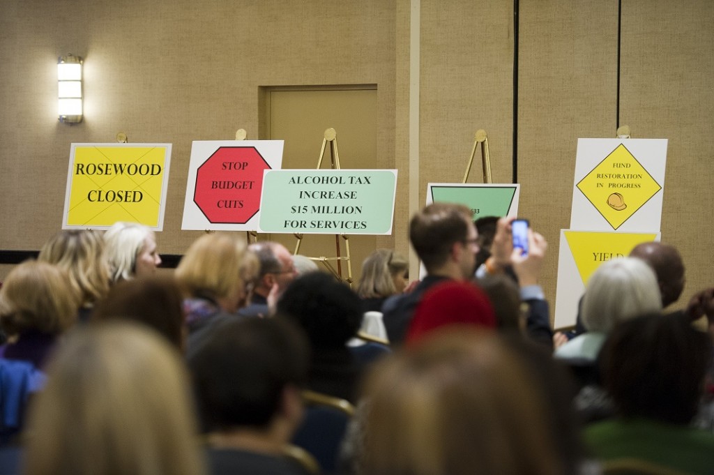 At a Maryland Developmental Disabilities Coalition meeting in 2012, signs showed some of the progress that had been made.  
