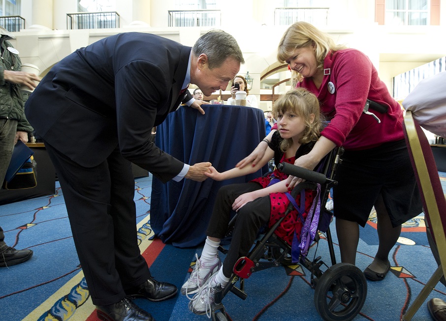Gov. Martin O'Malley greets girl in wheelchair at Maryland Developmental Disabilties Coalition meeting her addressed last year. Photo by MdGovPics on Flickr