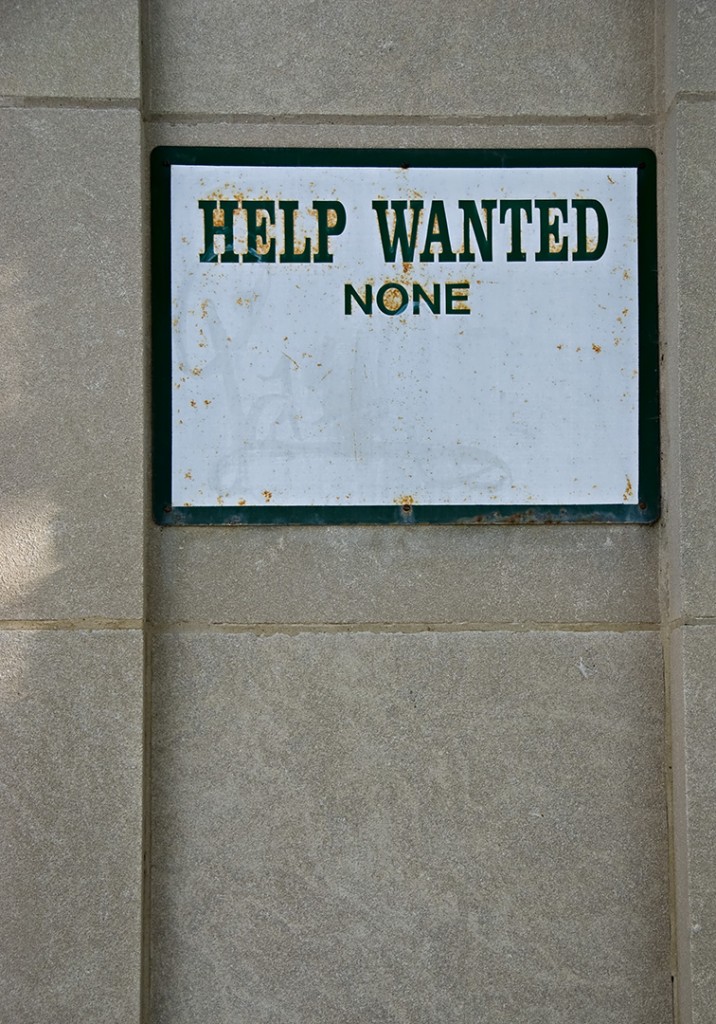 Sign says: Help wanted None.