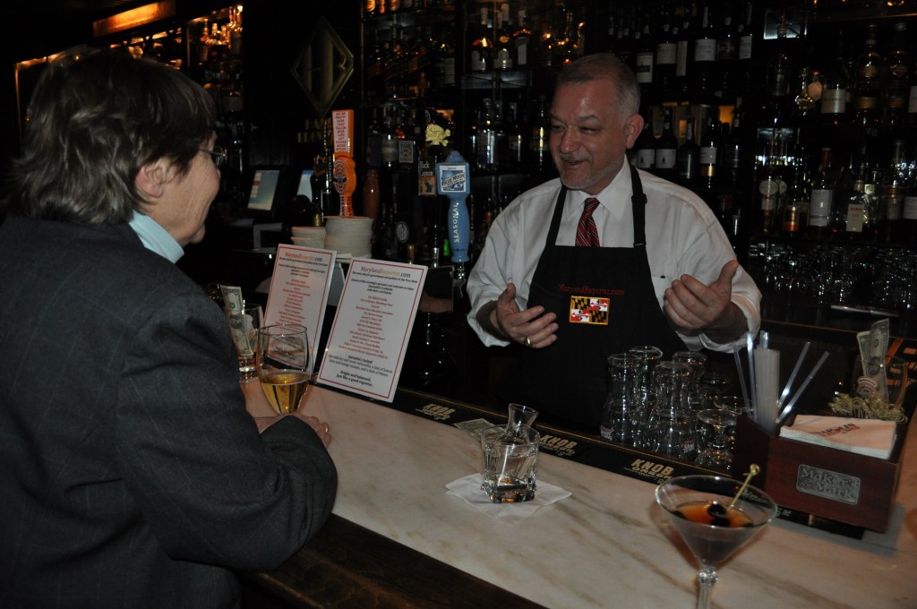 Celebrity bartender David Brinkley, the Senate minority leader, talks to Sue Esty of AFSCME.