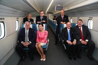 Gov. Larry Hogan and his wife Yumi, far left, seated take a quick ride on the MagLev train in Japan, June 2014. Governor's Office photo