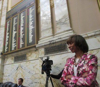 Sen. Catherine Pug catches paid sick leave vote on House floor. 