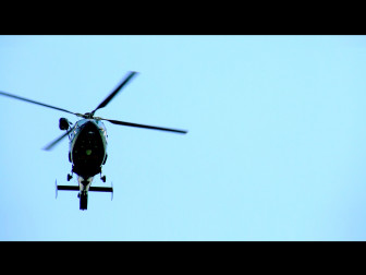 Photo by Flickr user JoshuaDavisPhotography. It shows a Maryland State Police helicopter conducting a missing persons search. Cell phone simulators have been used in missing persons cases.