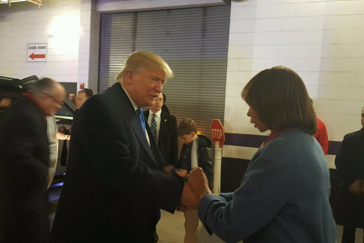 President-elect Donald Trump, left, accepts a letter from Baltimore Mayor Catherine Pugh. Photo from Pugh's Facebook page.
