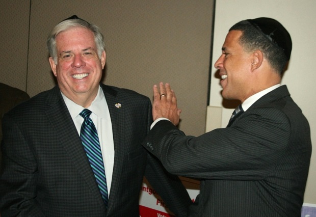 Hogan says Brown is stealing his message as race tightens