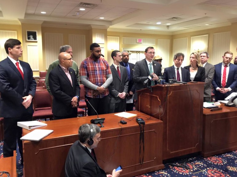 Sen. Michael Hough, center st podium, with Sen. Jamie Raskin and others discuss new comprehensive proposal on seizing assets. From Michael Hough's Facebook page. 