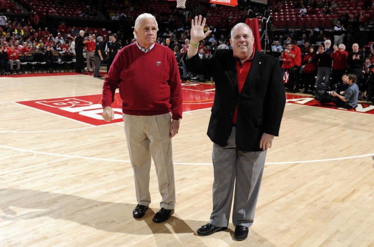 Gov. Larry Hogan waves to crowd from center court of the Xfinity Center in College Park, with Senate President Mike Miller at his side. Photo by Greg Fiume of Maryland Athletics on Hogan's Facebook page. 