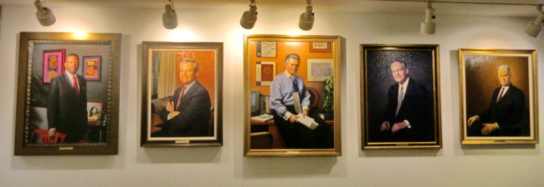 Portraits of past Howard County school superintendents hang in the Department of Education headquarters on Route 108. From right: John Yingling (1949-1968), M. Thomas Goedeke (1968-1984), Michael Hickey (1984-2000), John O'Rourke (2000-2004), and Sydney Cousin (2004-2012). Photo by Len Lazarick