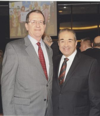 Howard County General Hospital President Vic Broccolino, right, at his retirement in 2013 with Ronald Peterson, president of the Johns Hopkins Health System. Photo by Caruso Studio, courtesy of Columbia Archives. 